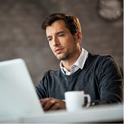 Man looking at laptop