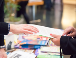 Employees organizing tradeshow support