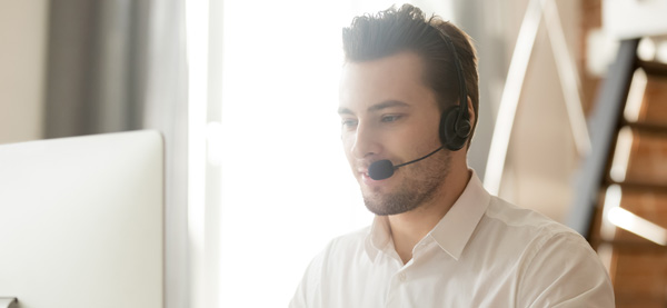 outsourced marketing firm employee working on computer