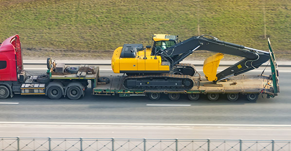 excavator on trailer